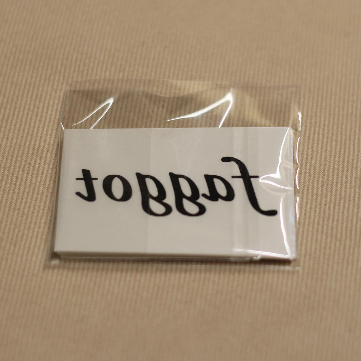 "Faggot" Temporary Tattoo